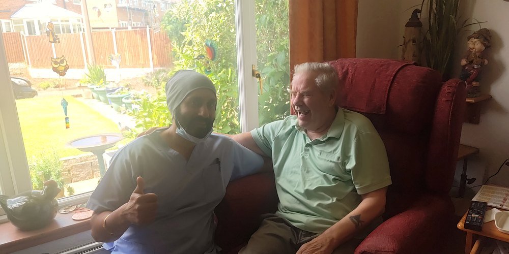 Home visit dentist in Birmingham caring for a patient at home